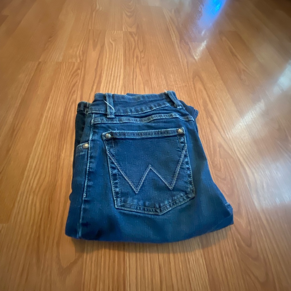 Women’s Wrangler boot cut jeans.